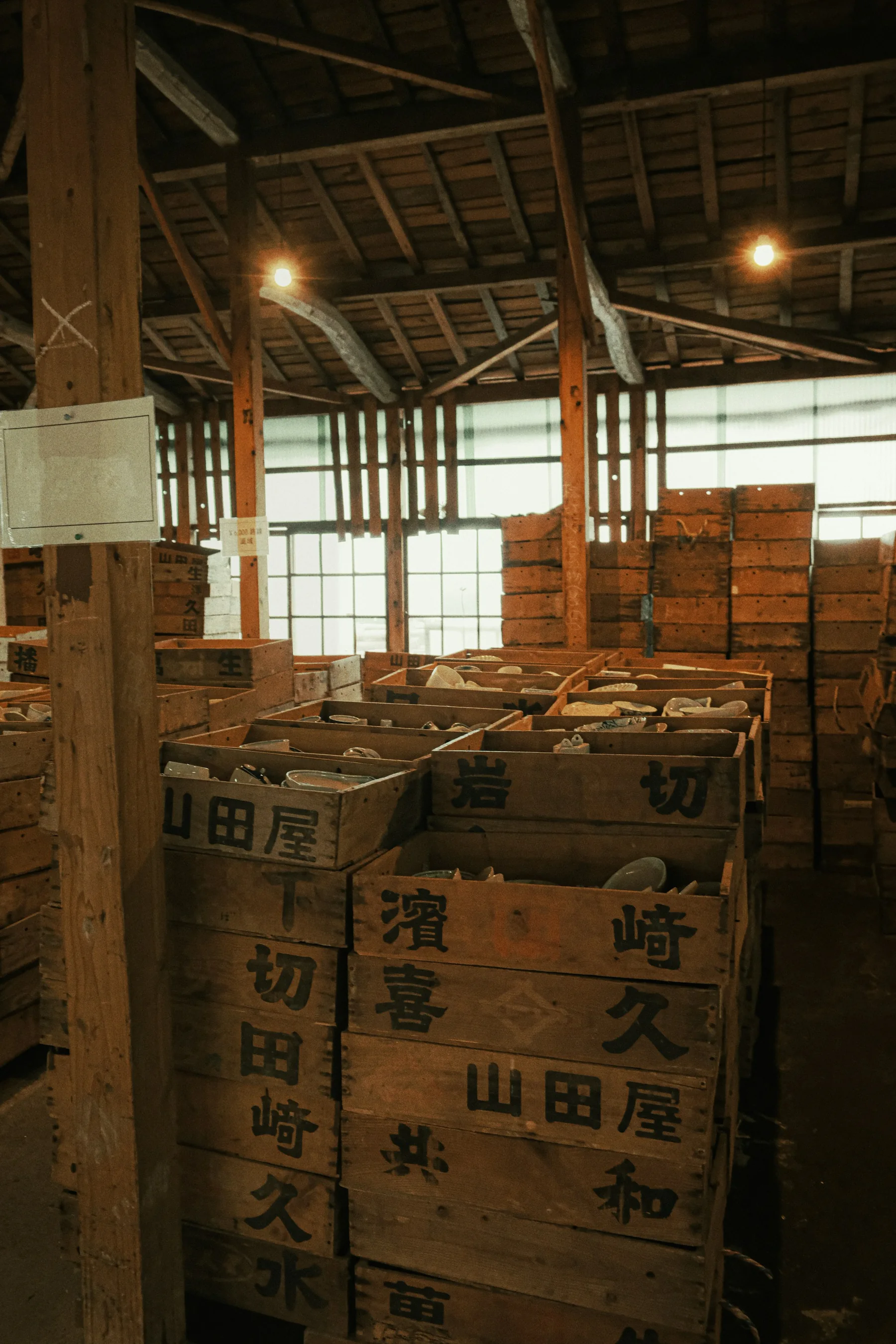 Warehouse supervisor using inventory management software with barcode scanner